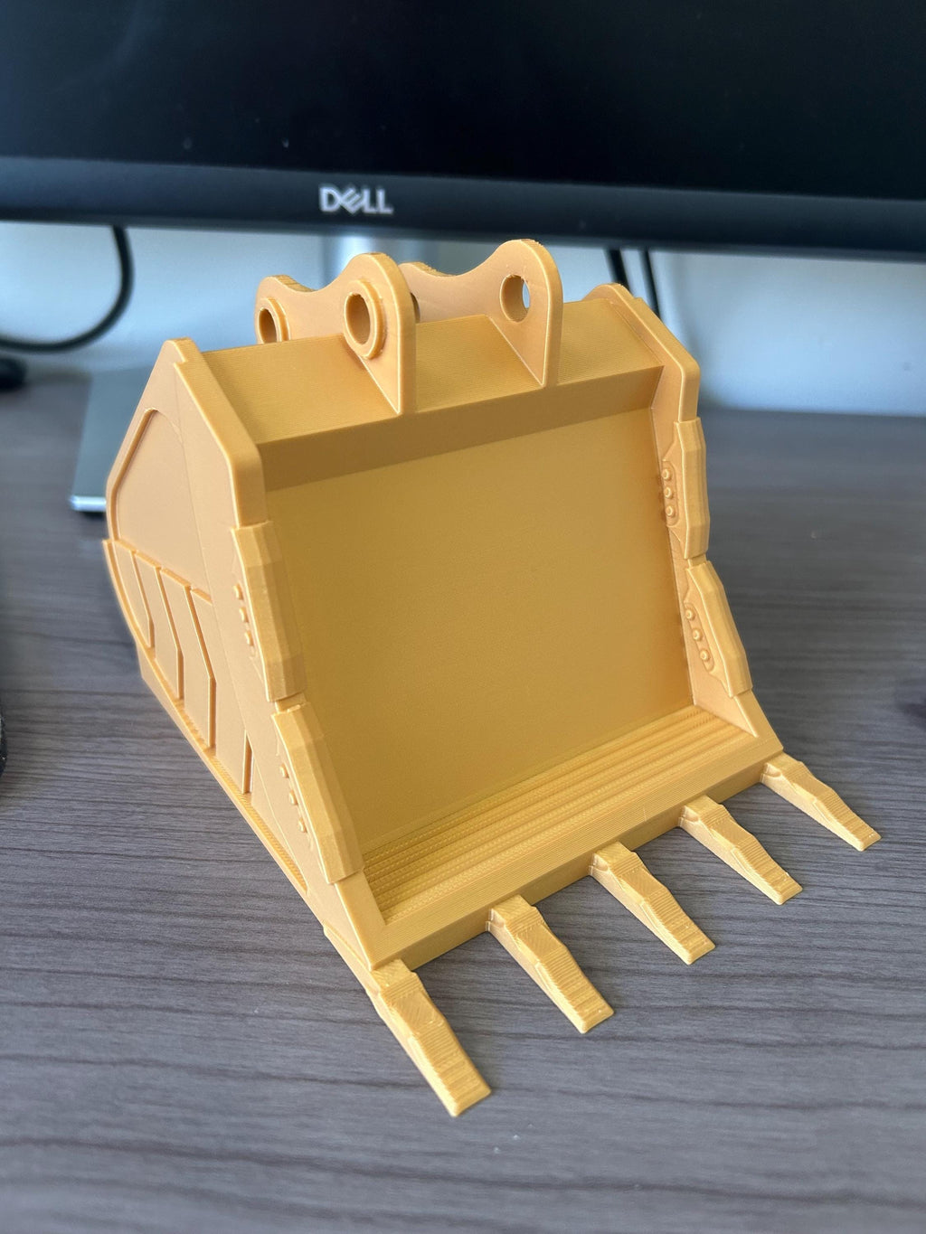 3D printed excavator bucket phone stand